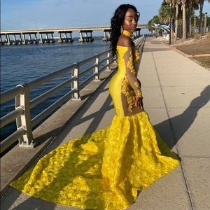 I am selling my custom made yellow prom dress.